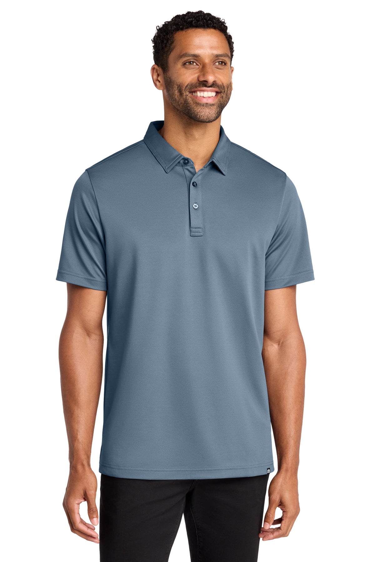TravisMathew Cabana Solid Polo in Light Denim Blue, front on model