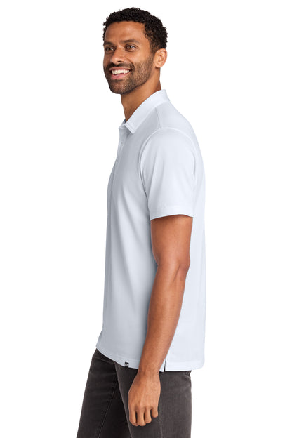TravisMathew Cabana Solid Polo in White, side on model