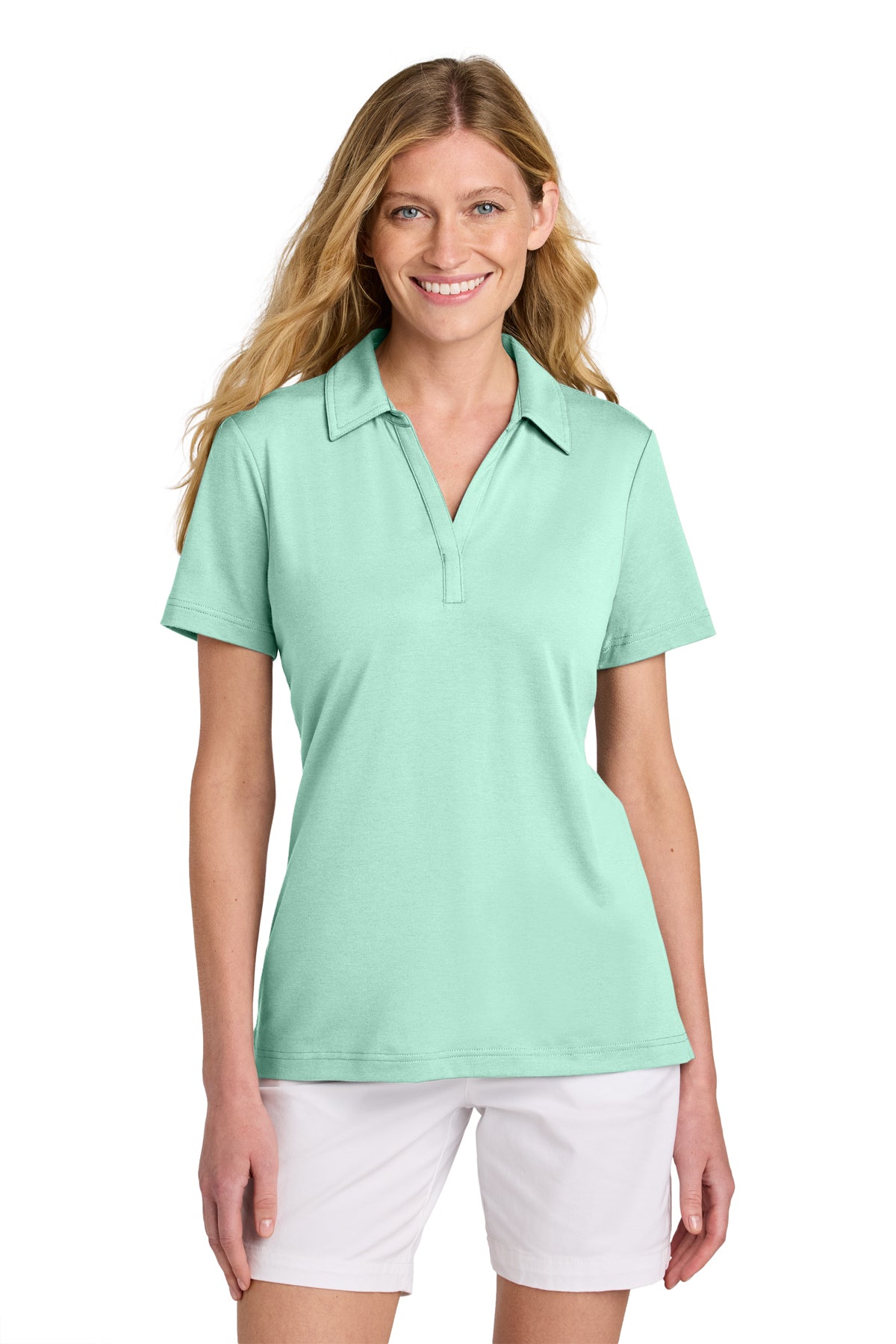 TravisMathew Women’s Glenview Solid Polo in Mint, front on model