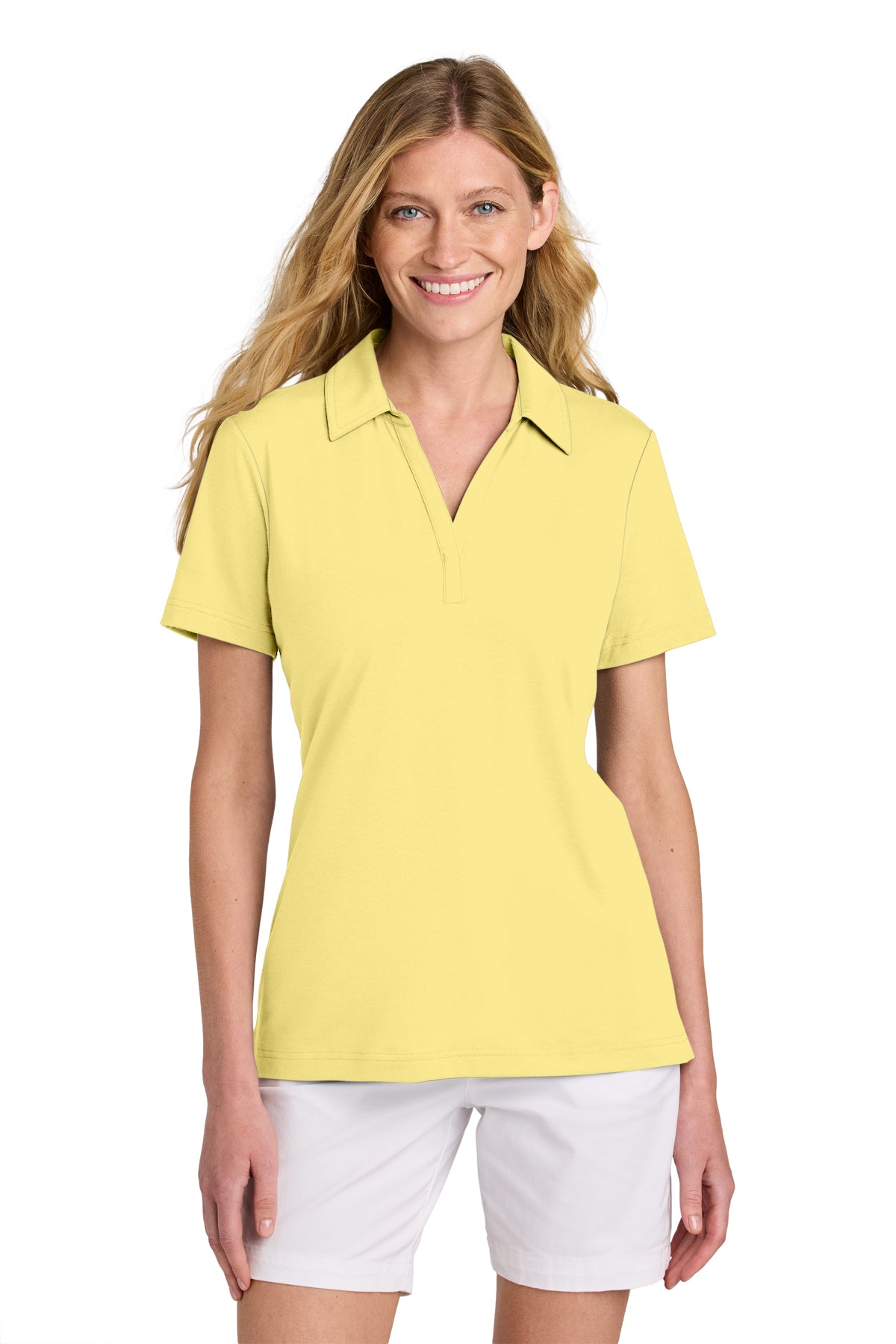 TravisMathew Women’s Glenview Solid Polo in Pale Yellow, front on model