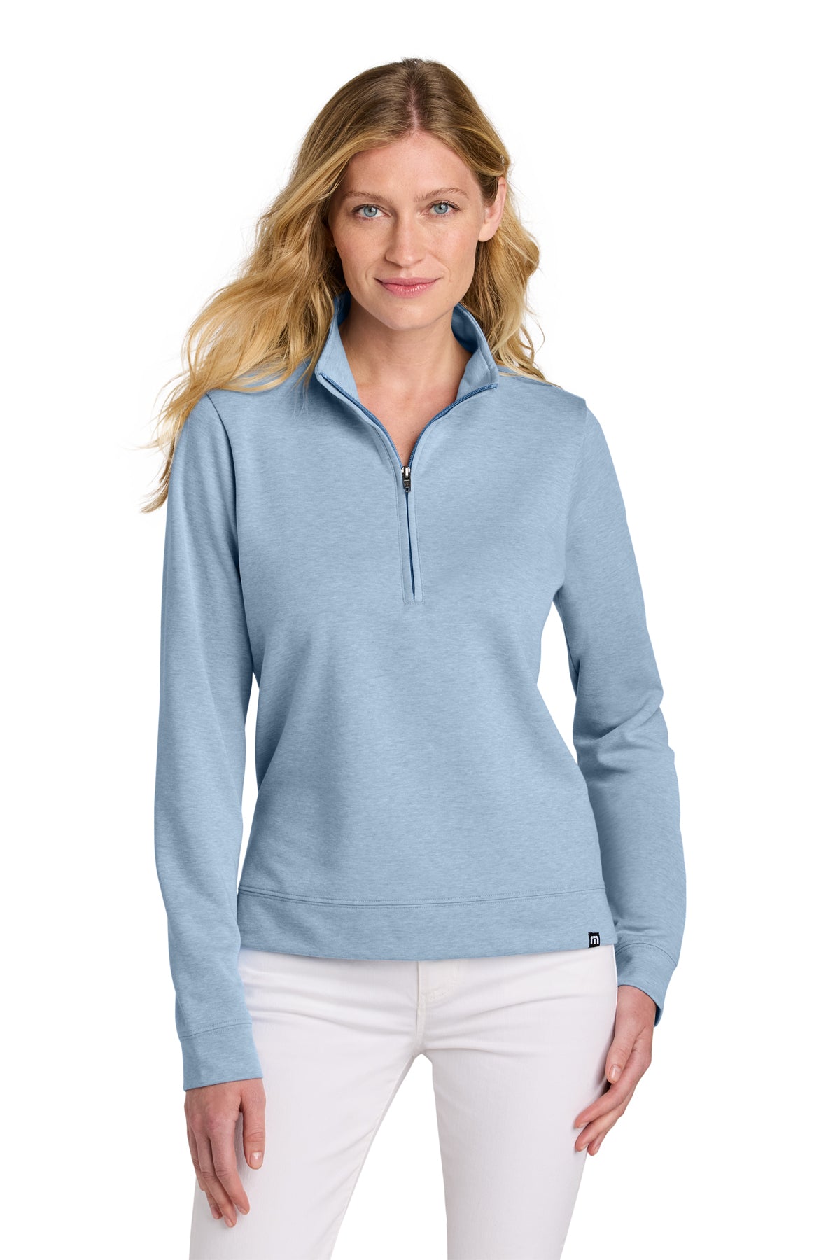 TravisMathew Women’s Coveside 1/2-Zip in Light Blue Heather, front on model