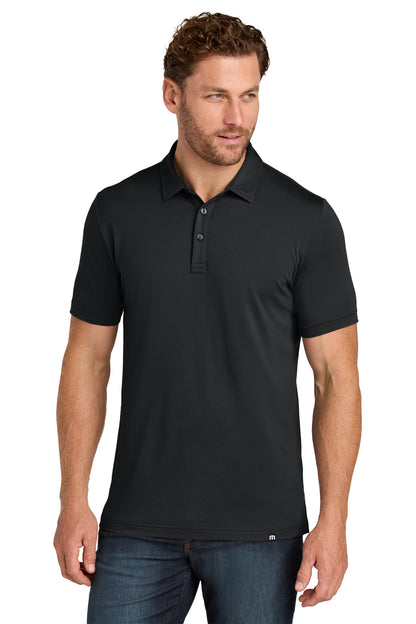 TravisMathew Glenview Solid Polo in Black, front on model