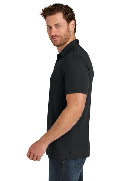TravisMathew Glenview Solid Polo in Black, side on model