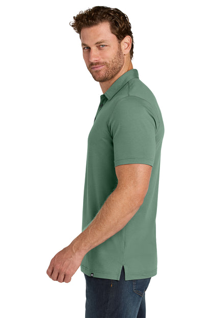 TravisMathew Glenview Solid Polo in Laurel Green, side on model