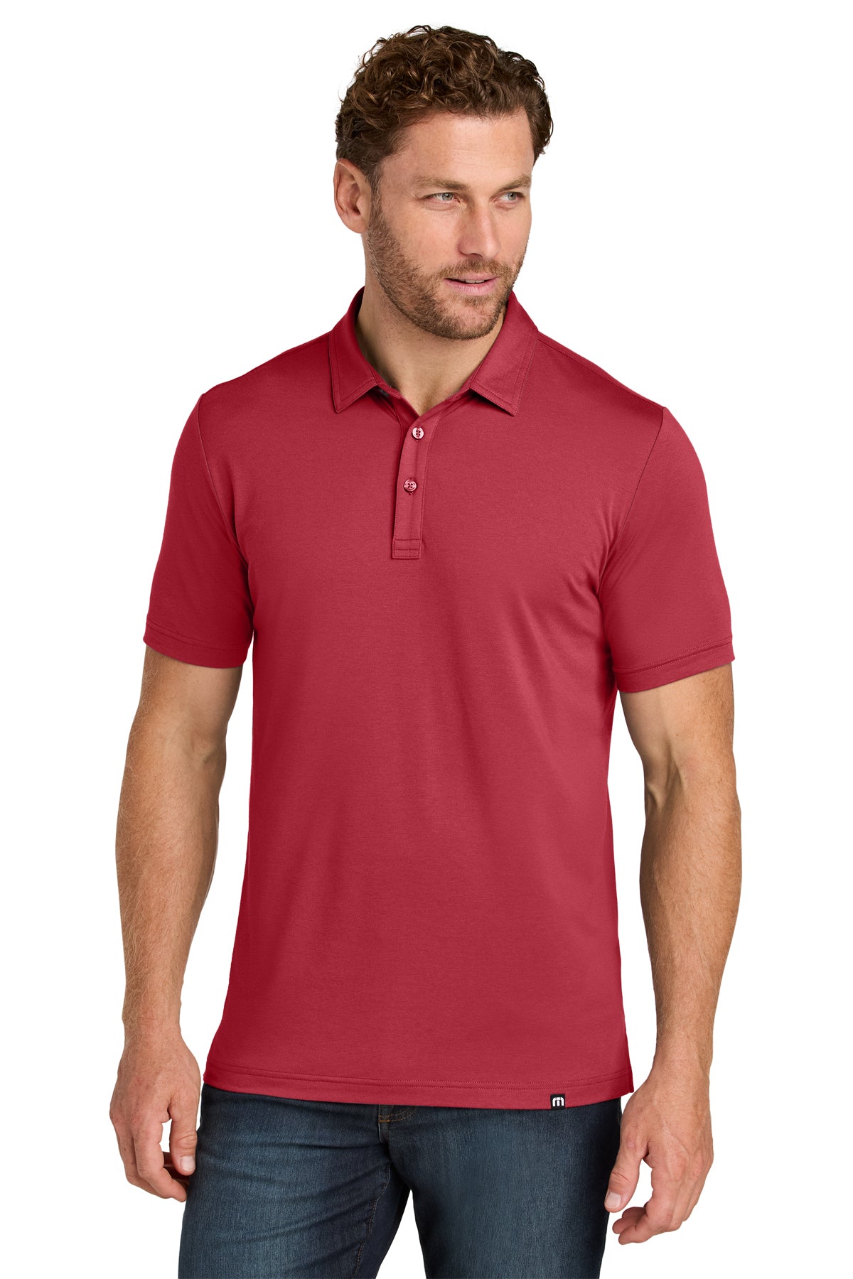 TravisMathew Glenview Solid Polo in Scooter Red, front on model