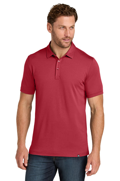 TravisMathew Glenview Solid Polo in Scooter Red, front on model