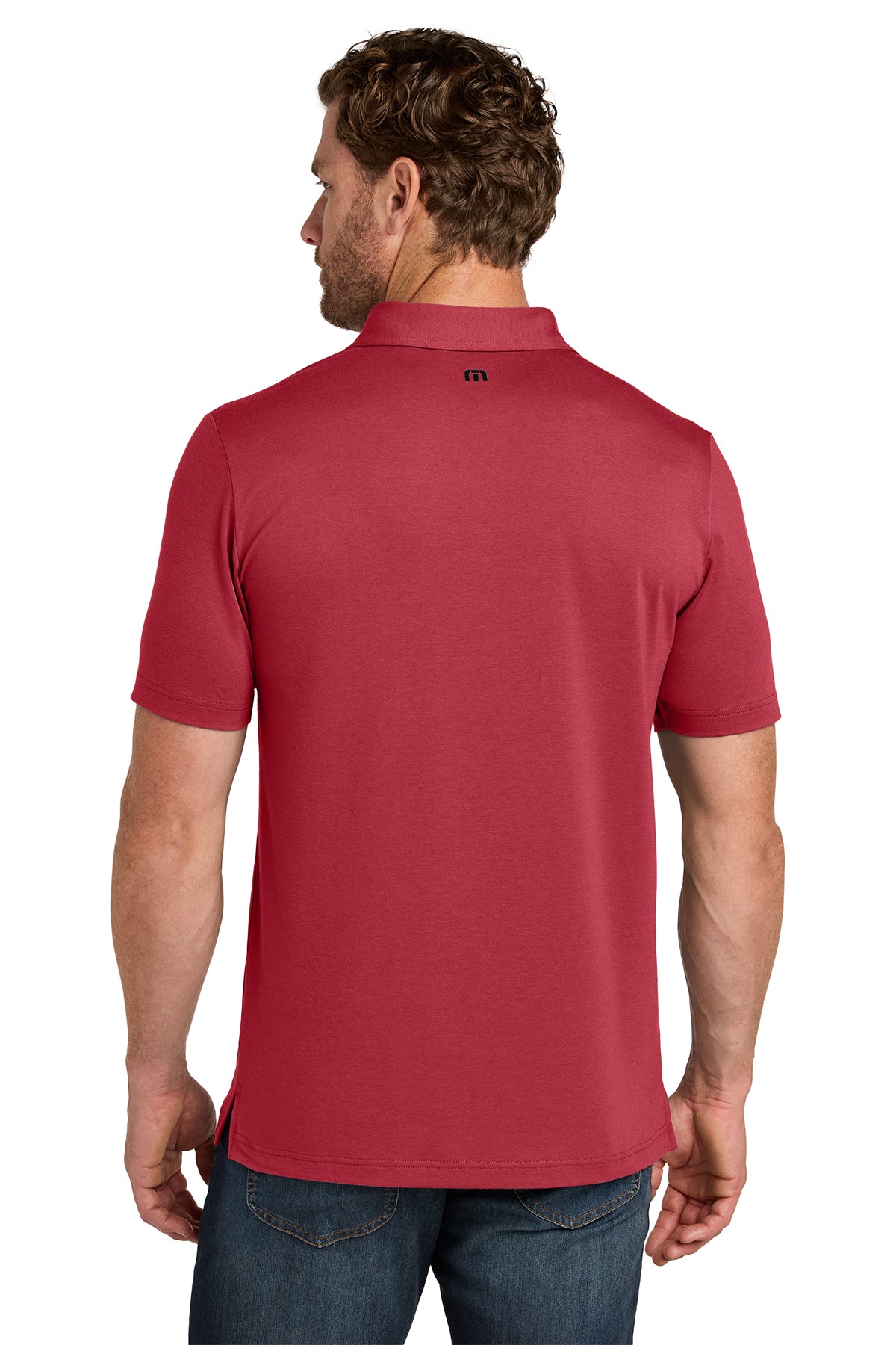 TravisMathew Glenview Solid Polo in Scooter Red, back on model