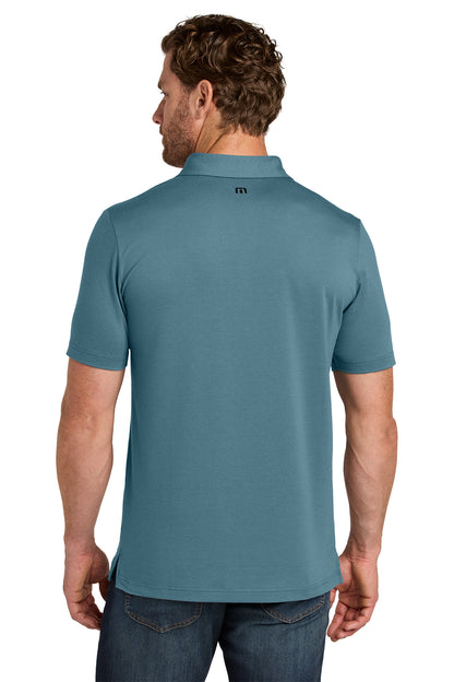 TravisMathew Glenview Solid Polo in Stellar Blue, back on model