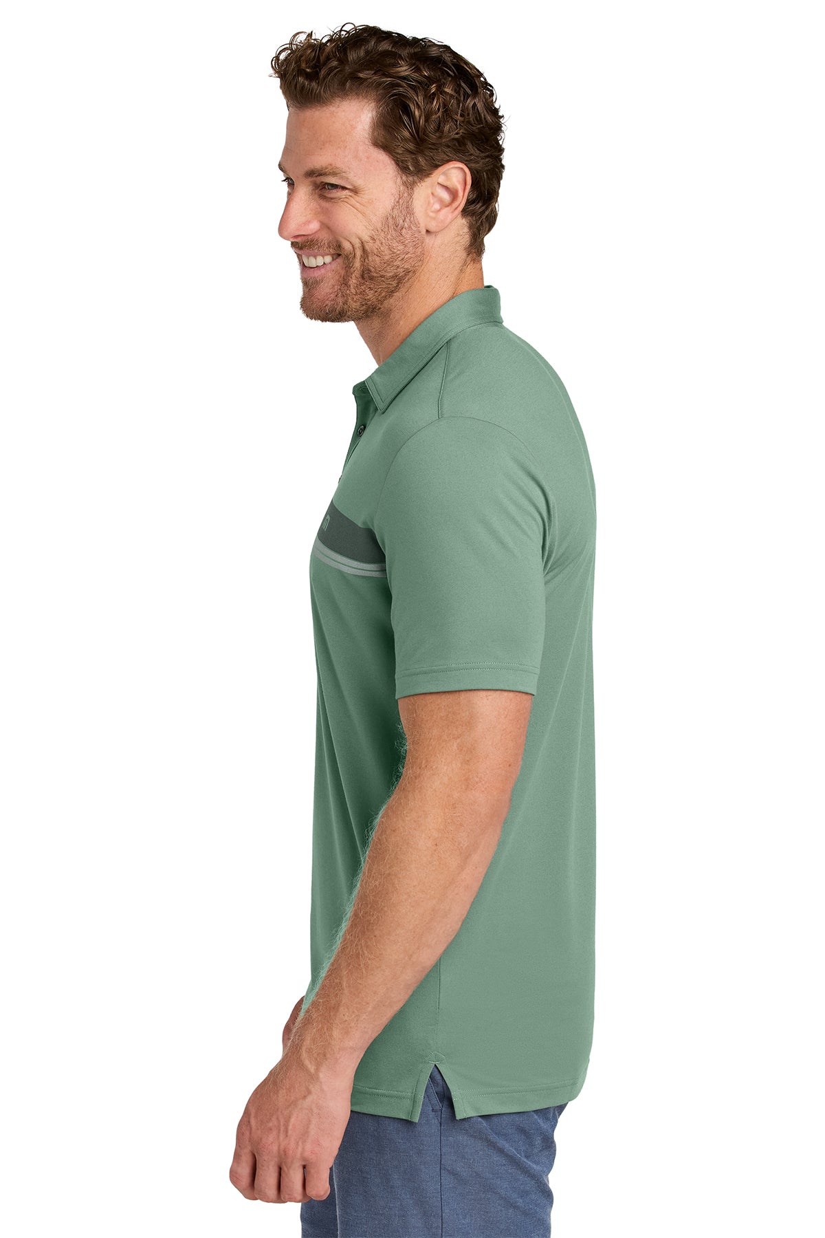 TravisMathew Glenview Stripe Polo in Laurel Green, side on model