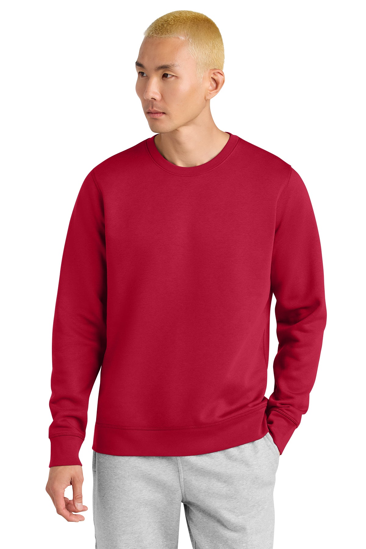 Stanley/Stella Unisex Roller Crewneck Sweatshirt in Red, front on model