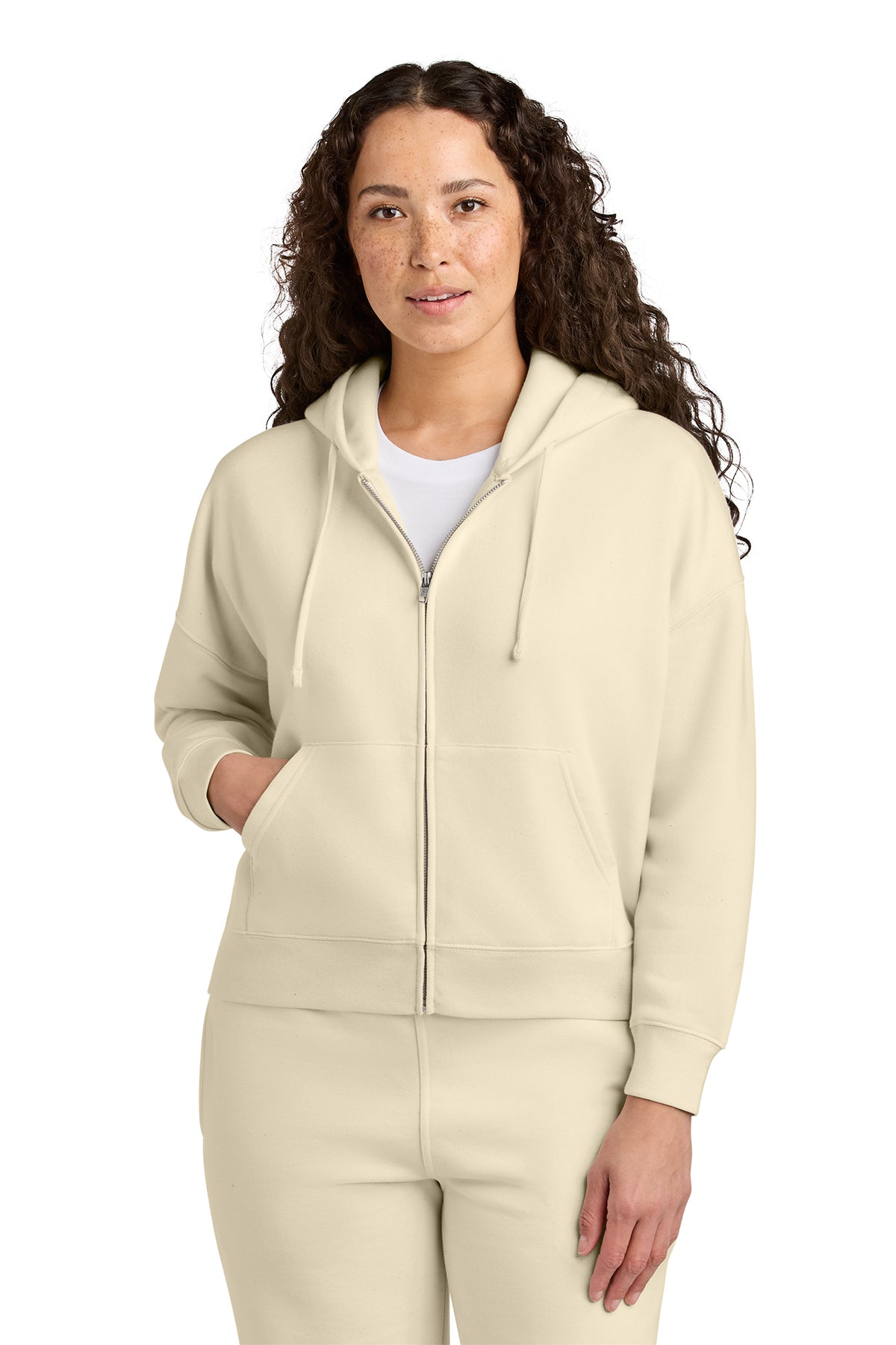 Stanley/Stella Women’s Stella Ida Full-Zip Hooded Sweatshirt in Natural Raw, front on model