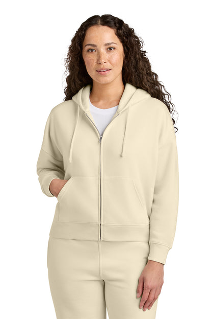 Stanley/Stella Women’s Stella Ida Full-Zip Hooded Sweatshirt in Natural Raw, front on model
