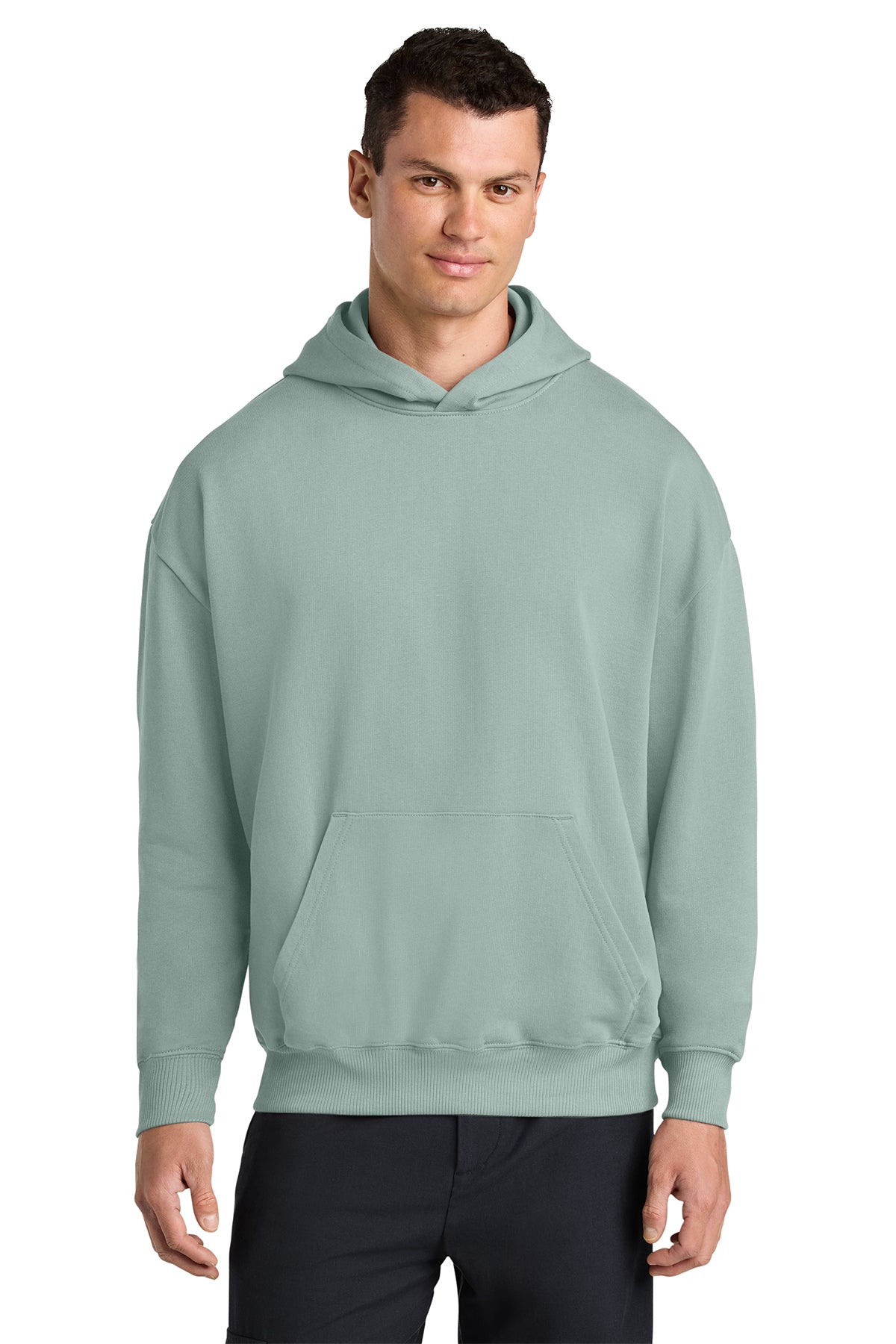 Stanley/Stella Unisex Cooper Dry Hooded Sweatshirt in Aloe, front on model