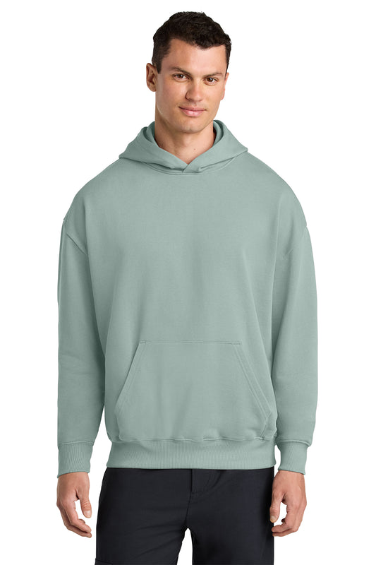 Stanley/Stella Unisex Cooper Dry Hooded Sweatshirt in Aloe, front on model