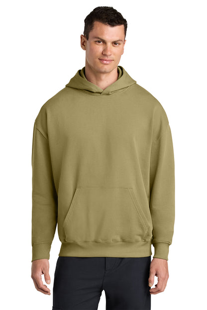 Stanley/Stella Unisex Cooper Dry Hooded Sweatshirt in Faded Olive, front on model