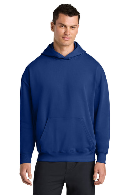 Stanley/Stella Unisex Cooper Dry Hooded Sweatshirt in Worker Blue, front on model