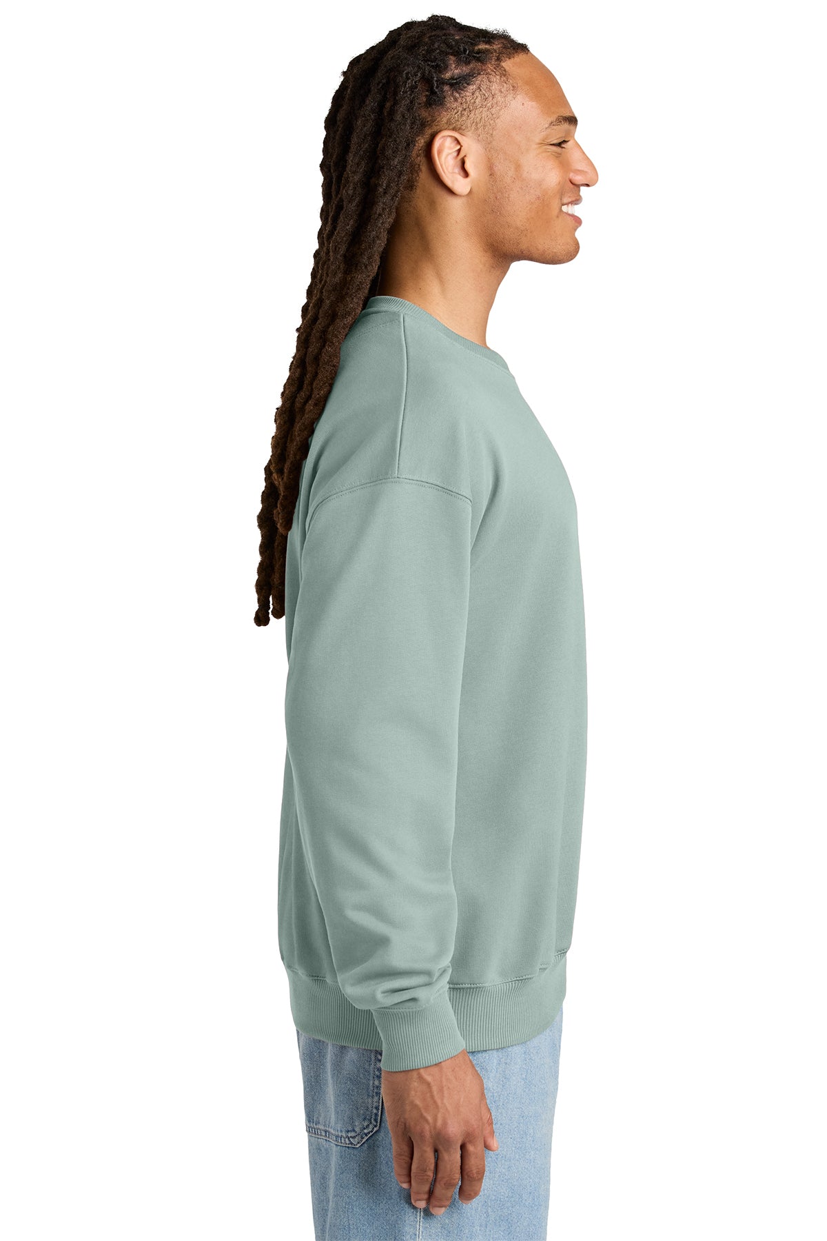 Stanley/Stella Unisex Ledger Dry Crewneck Sweatshirt in Aloe, side on model