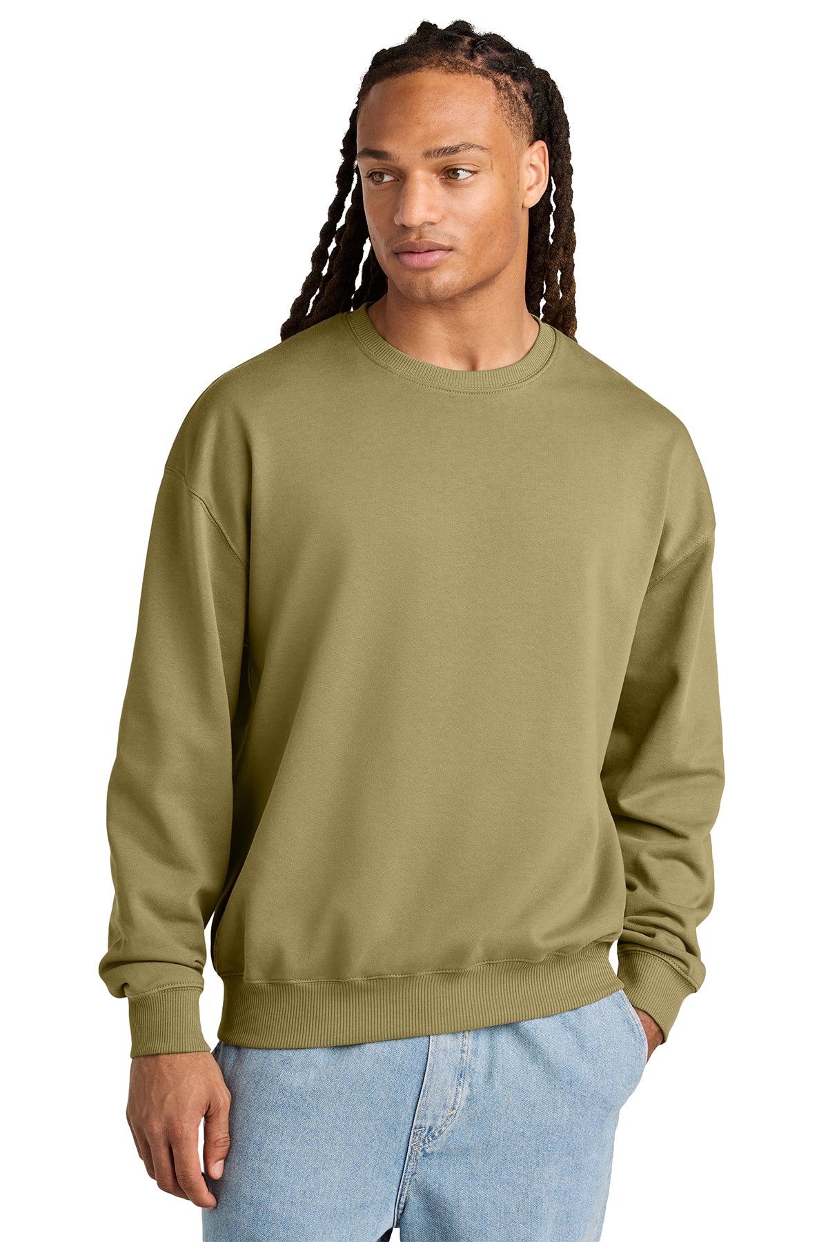 Stanley/Stella Unisex Ledger Dry Crewneck Sweatshirt in Faded Olive, front on model