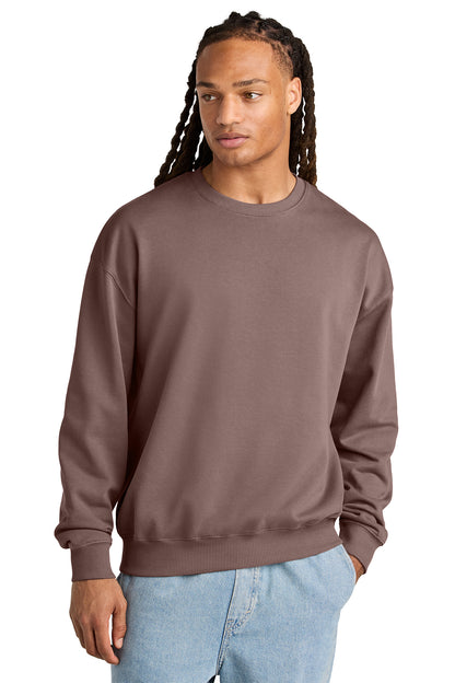 Stanley/Stella Unisex Ledger Dry Crewneck Sweatshirt in Kaffa Coffee, front on model