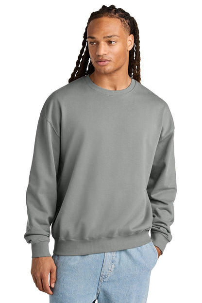 Stanley/Stella Unisex Ledger Dry Crewneck Sweatshirt in Misty Grey, front on model