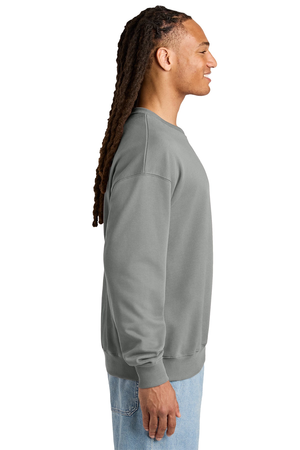 Stanley/Stella Unisex Ledger Dry Crewneck Sweatshirt in Misty Grey, side on model