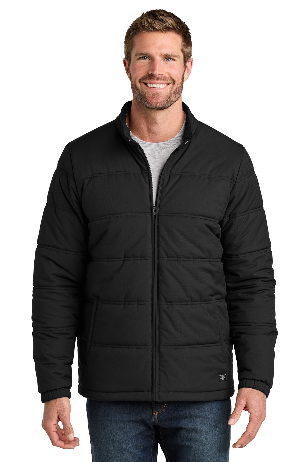 TravisMathew Cold Bay Jacket in Black, front on model