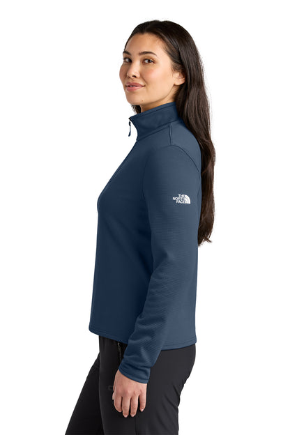 The North Face Women’s Aim 1/4-Zip Fleece in Summit Navy, side on model