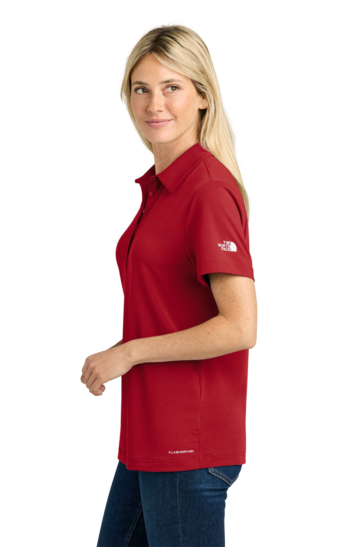 The North Face Women’s Canyon Crest Polo in TNF Red, side on model