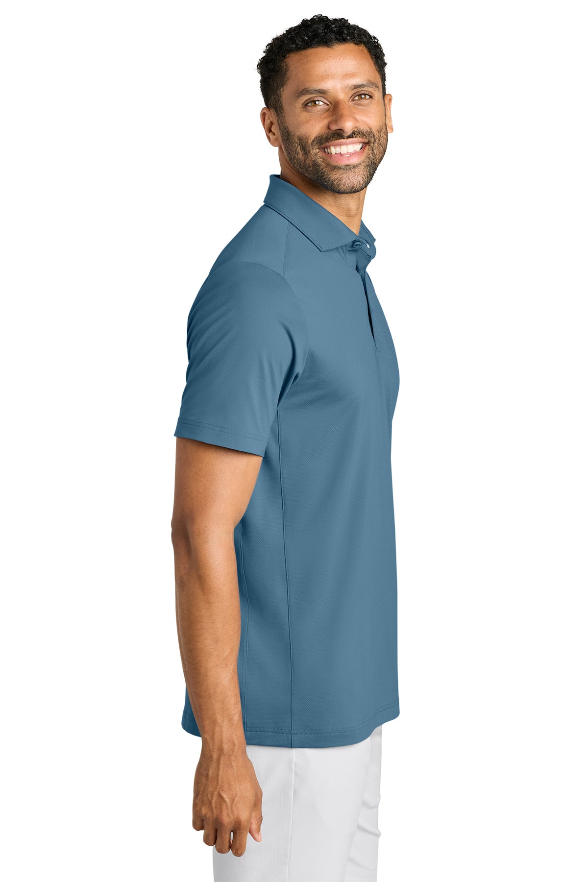 TravisMathew Onward Polo in Copen Blue, side on model