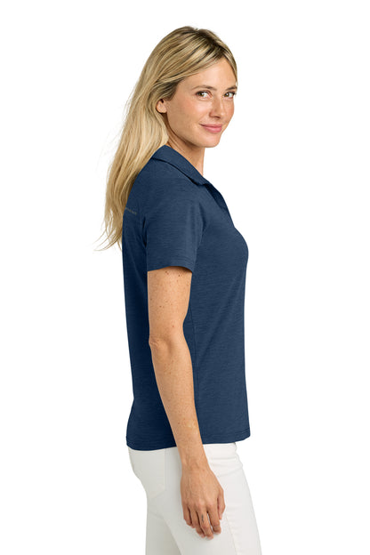 TravisMathew Women’s Onward Polo in Navy Heather, side on model