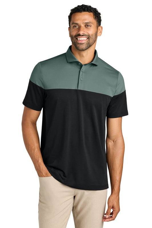 TravisMathew Onward Colorblock Polo in Balsam Green/ Black, front on model