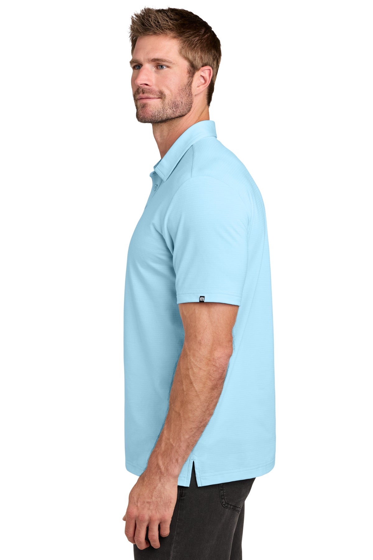 TravisMathew Crestview Polo in Dream Blue, side on model