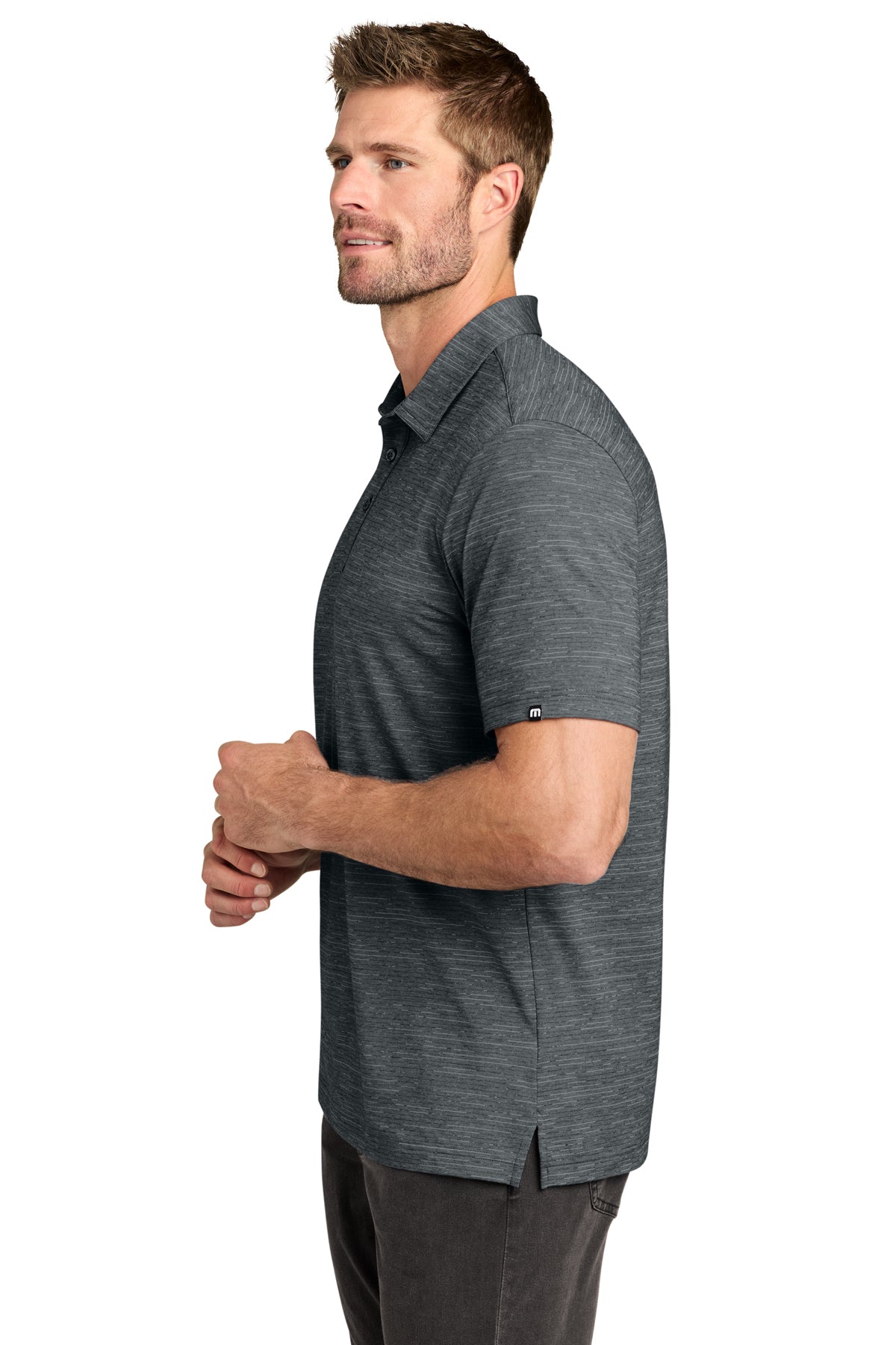 TravisMathew Crestview Polo in Grey Heather, side on model