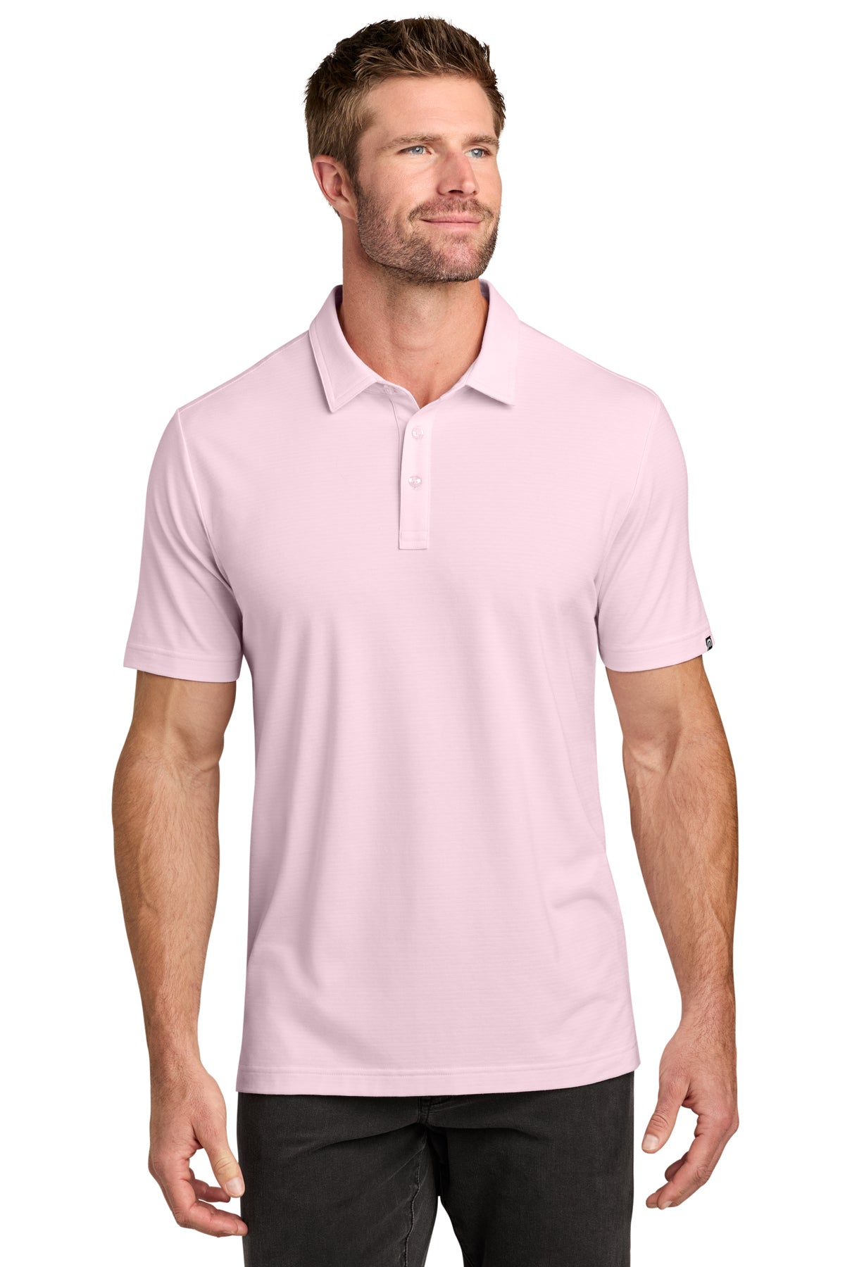 TravisMathew Crestview Polo in Stone Pink, front on model