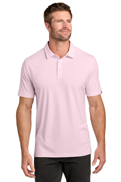 TravisMathew Crestview Polo in Stone Pink, front on model