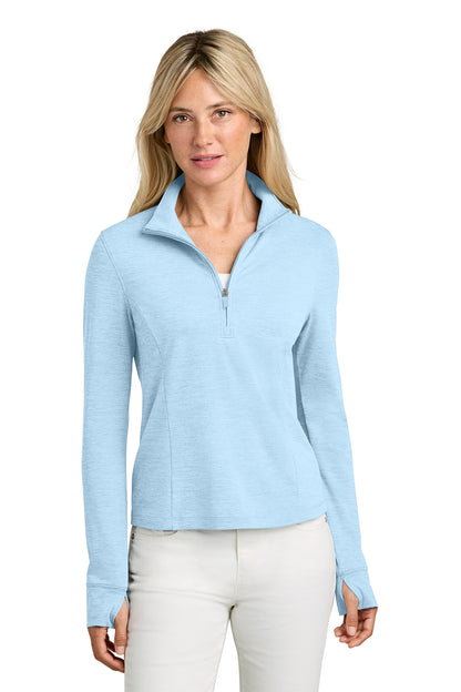 TravisMathew Women’s Onward 1/2-Zip in Airy Blue Heather, front on model