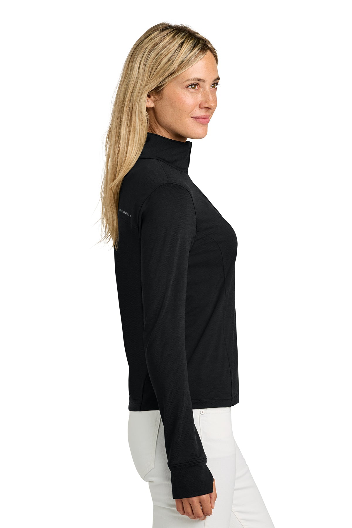 TravisMathew Women’s Onward 1/2-Zip in Black, side on model