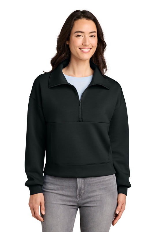 TravisMathew Women’s Momentum Shift 1/2-Zip in Black, front on model