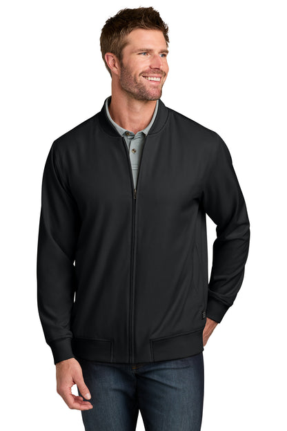 TravisMathew Bomber Jacket in Black, front on model