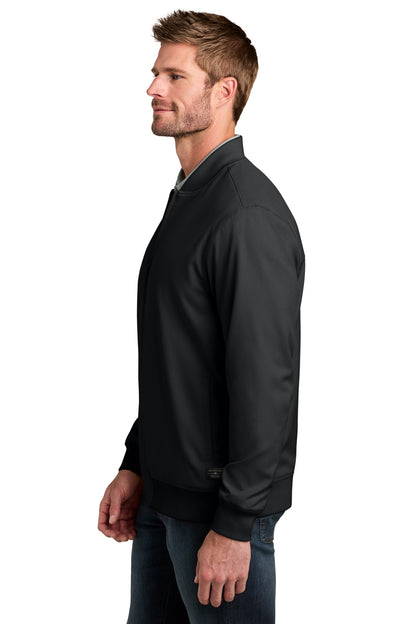 TravisMathew Bomber Jacket in Black, side on model