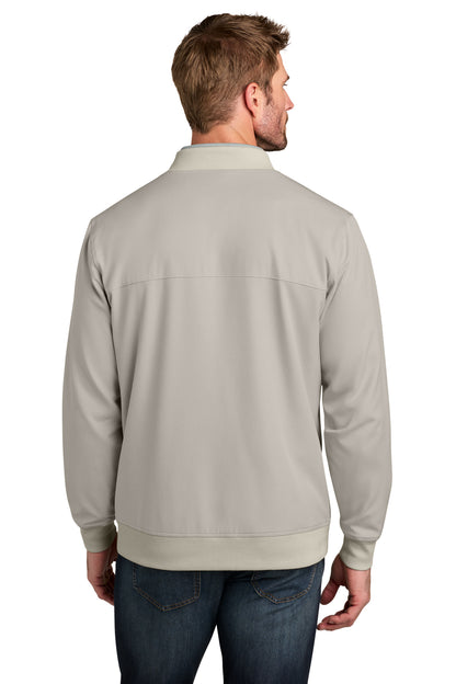 TravisMathew Bomber Jacket in Italian Sand, back on model