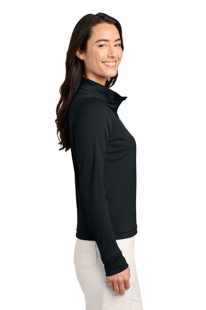 TravisMathew Women’s Coto 1/2-Zip in Black, side on model