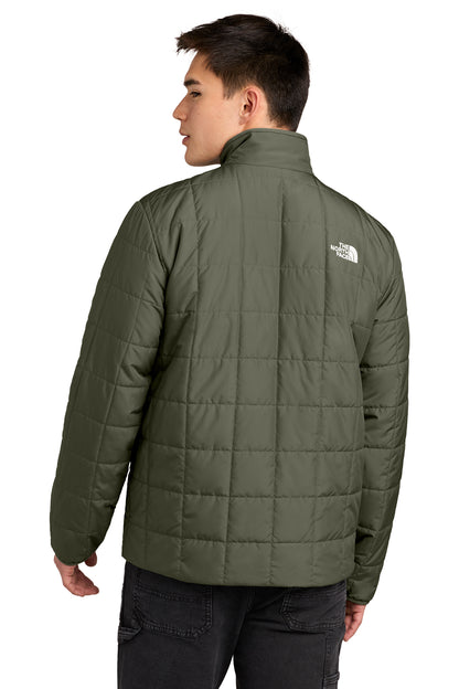 The North Face Iron Drift Quilted Jacket in New Taupe Green, back on model