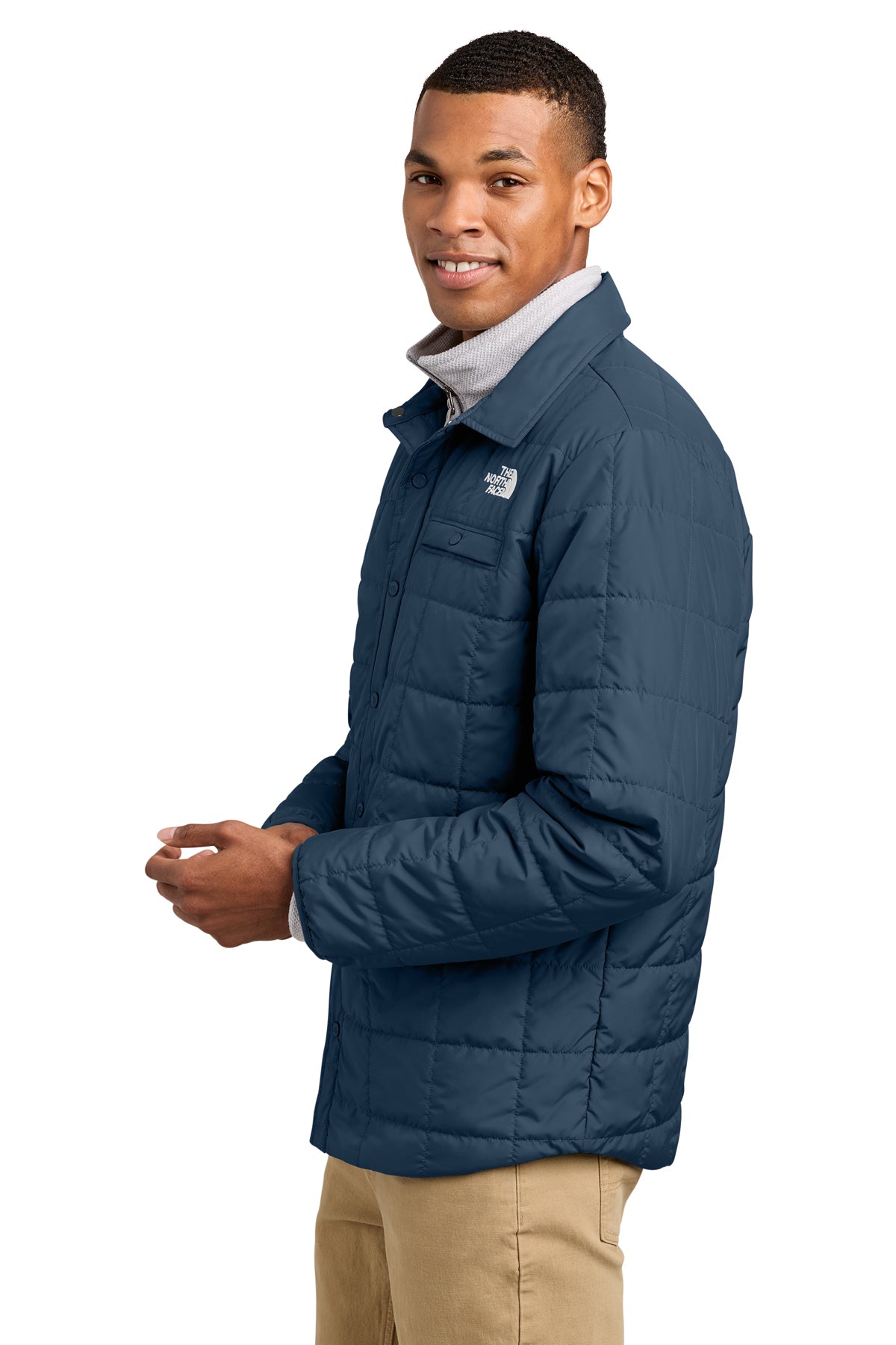 The North Face Iron Drift Quilted Shirt Jacket in Summit Navy, side on model
