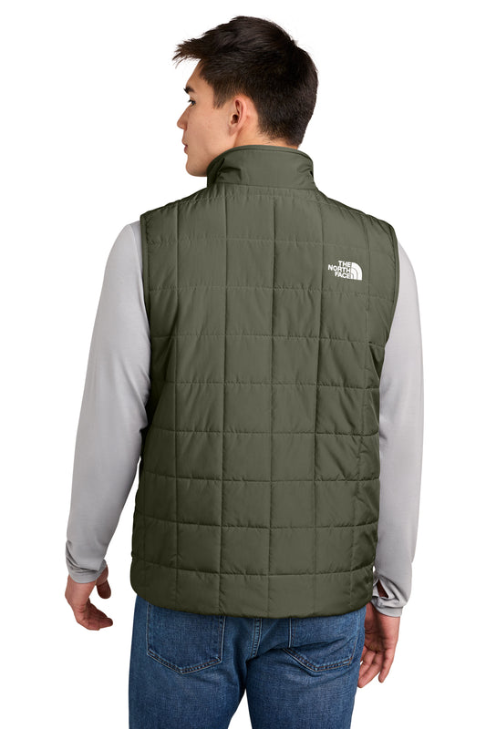 The North Face Iron Drift Quilted Vest in New Taupe Green, back on model