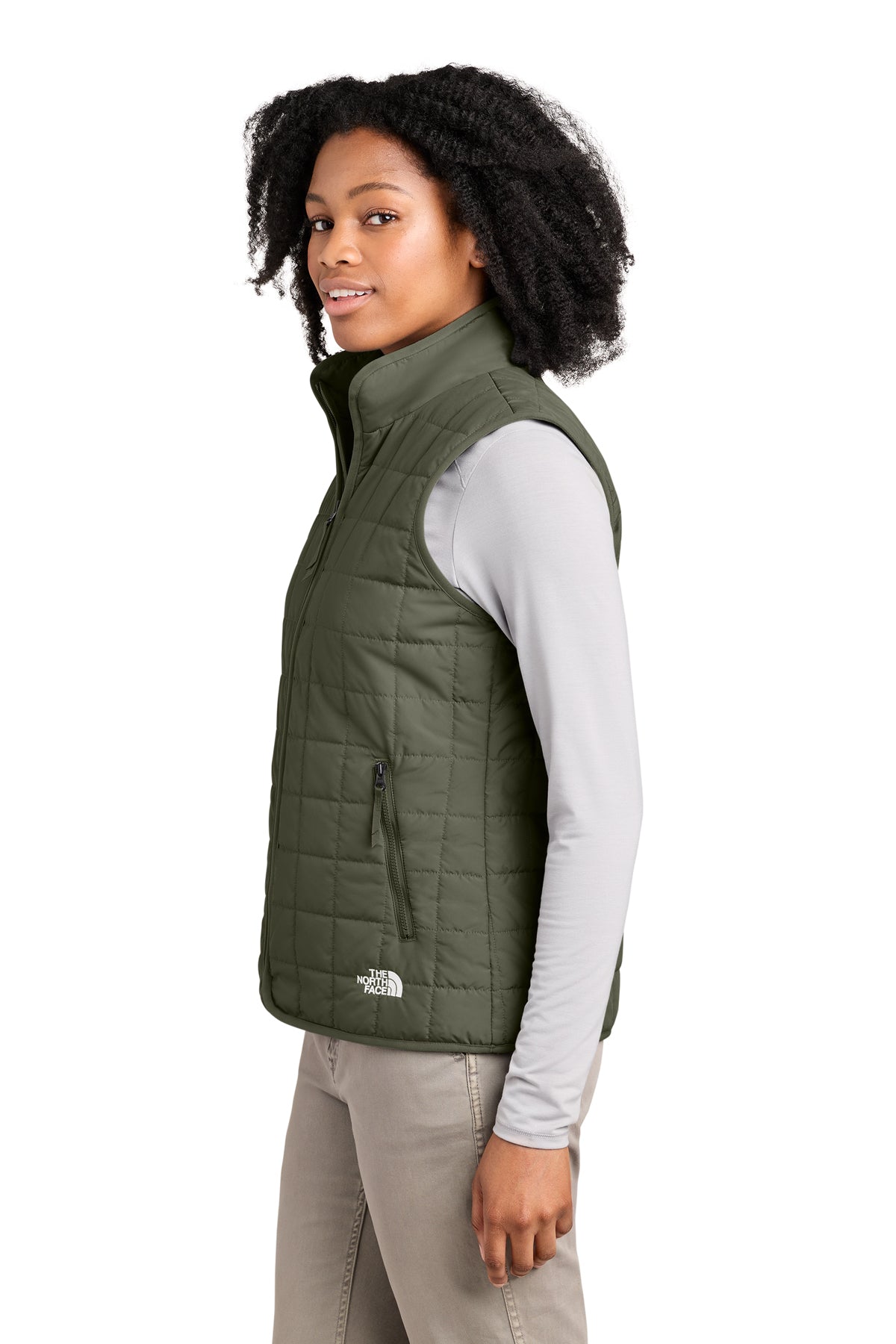 The North Face Women’s Iron Drift Quilted Vest in New Taupe Green, side on model