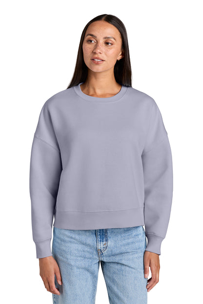 Stanley/Stella Women’s Stella Alma Crewneck Sweatshirt in Lavender, front on model