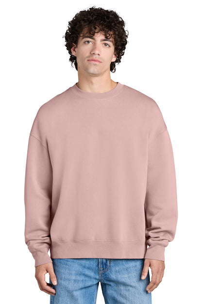 Stanley/Stella Unisex Easer Vintage Crewneck Sweatshirt in G. Dyed Blush, front on model